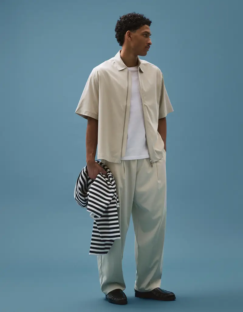 Bershka Pantaloni Super Baggy Fit Con Pinces Fluidi Uomo Pietra