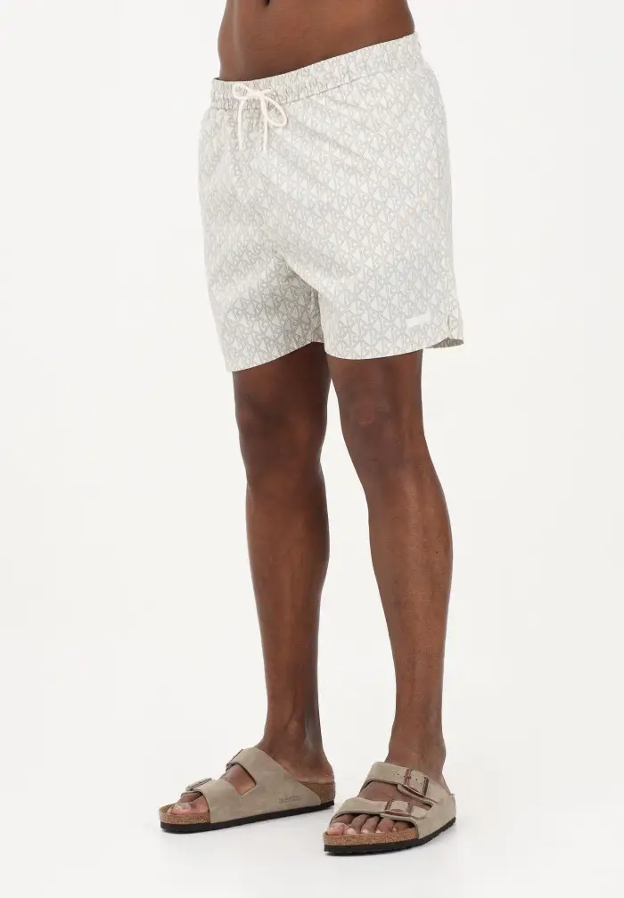 Shorts mare panna da uomo con micro fantasia monogram