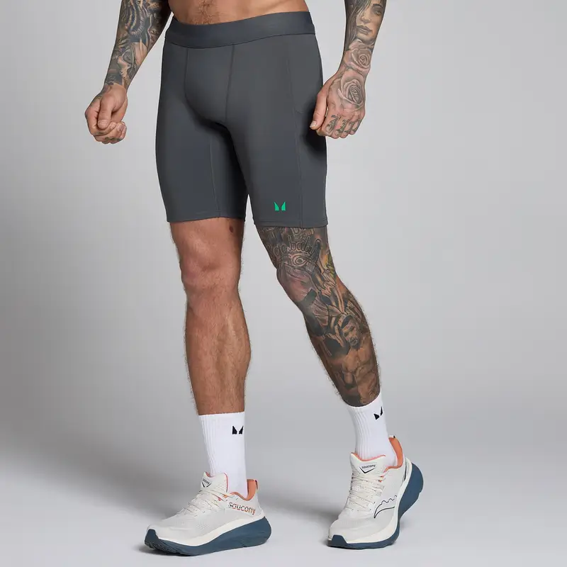 MyProtein Pantaloncini a mezza lunghezza MP uomo Hybrid con tasche - Grigio scuro/verde