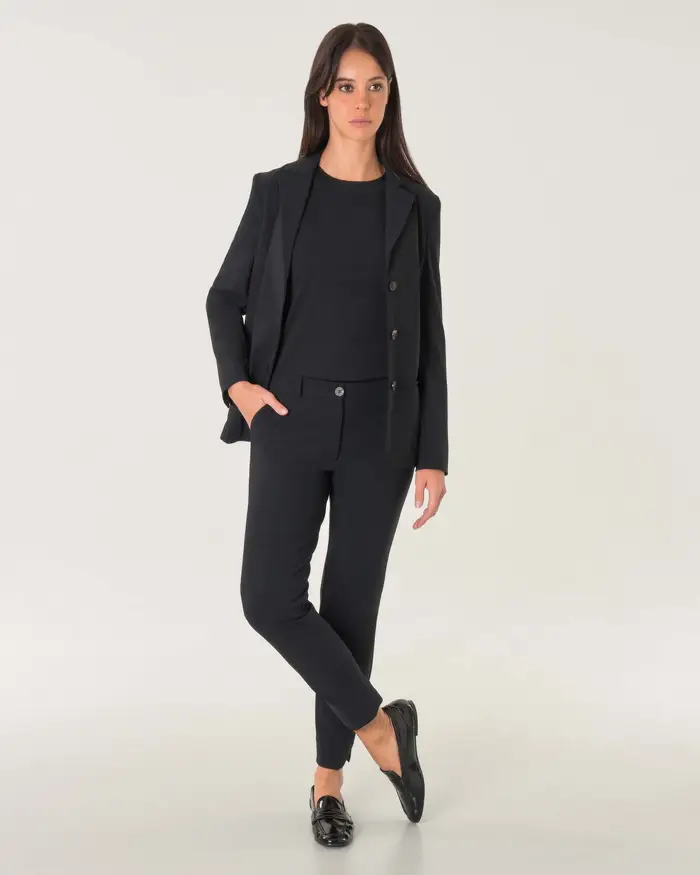 Pantaloni slim neri in tessuto tecnico lunghezza alla caviglia con spacchetti laterali