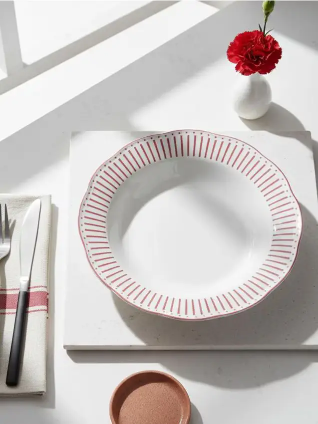 Ciotola in ceramica con motivo decorativo sul bordo - rosa cipria
