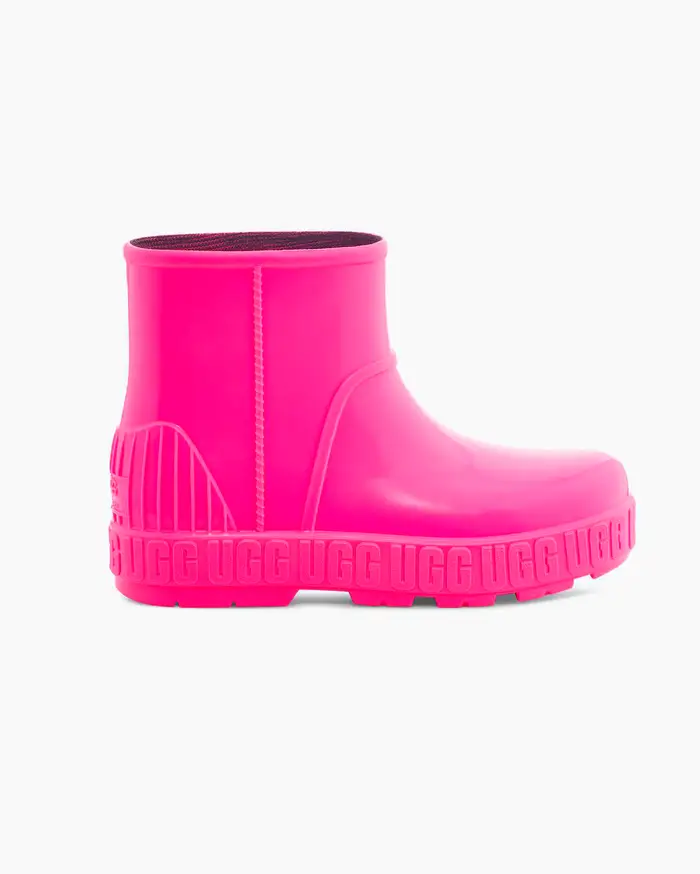 Stivaletto rosa fluo Drizlita Mini in gomma lucida antipioggia con scritta logo lungo la suola